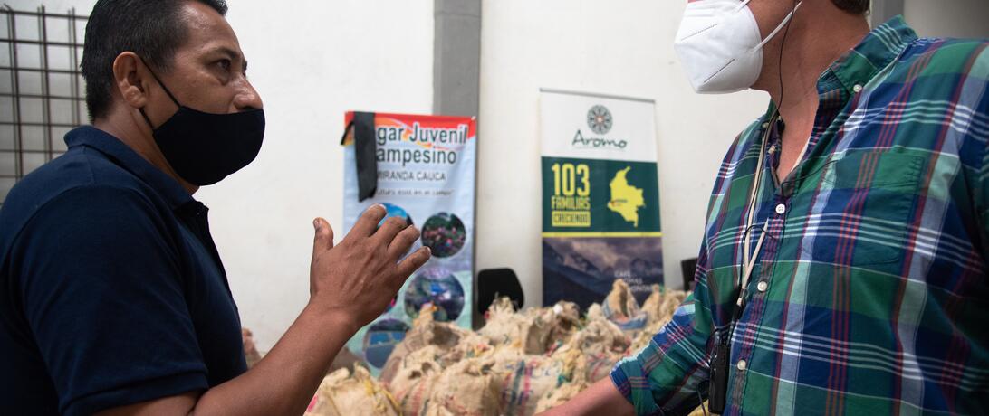 Jon Bellish talking to a local producer